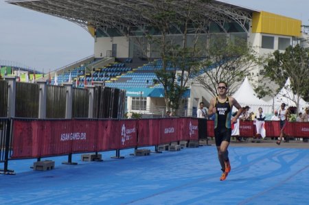 Триатлоншы Аян Бейсенбаев Азия ойындарының күміс медалін жеңіп алды
